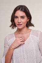 model wearing Gold Plated Hinged Hooped Earrings