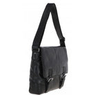 A black leather messenger bag with a wide shoulder strap, front flap pocket, and buckle details, shown against a plain white background.