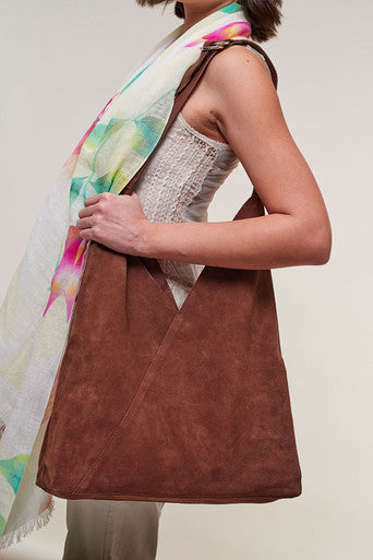model wearing Suede Slouch Bag